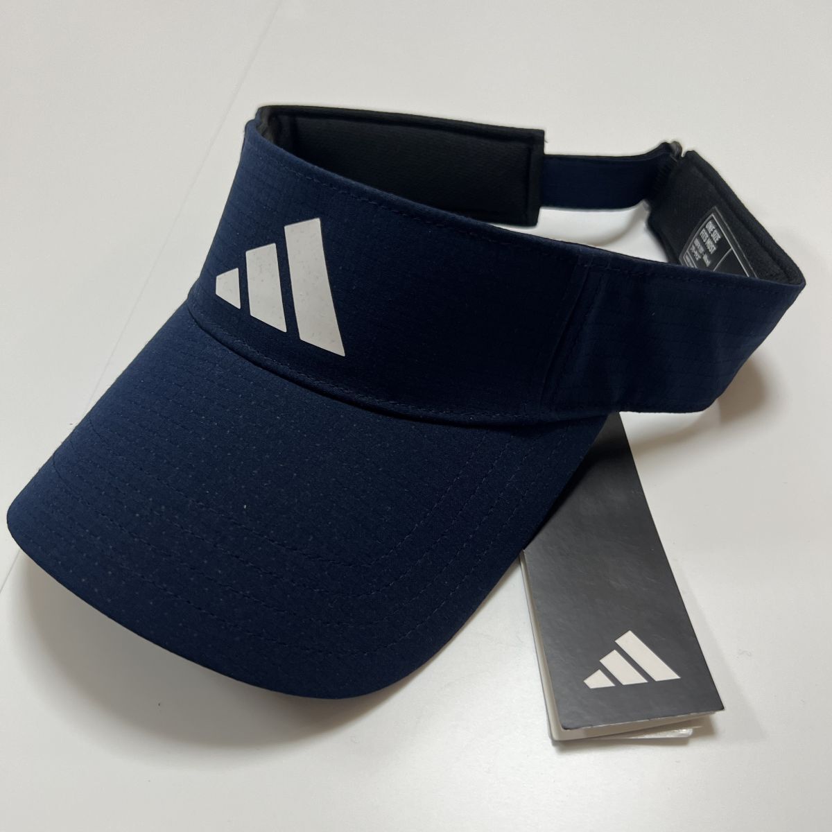 ★アディダス ゴルフ ADIDAS GOLF 新品 メンズ ゴルフツアーバイザー キャップ 帽子 CAP サンバイザー 57-60cm 紺[HT3330-5760]七 ★QWERの画像1