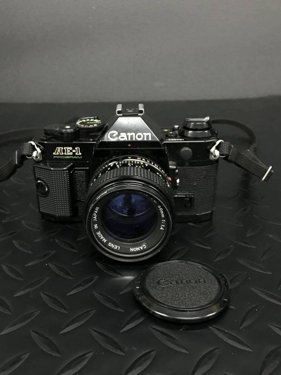 C879★Canon キャノン AE-1 CANON LENS FD 50mm 1:1.4 フィルムカメラ 空シャッター確認済み※GW休暇の為4/30以降は発送が5/7～になりますの画像1
