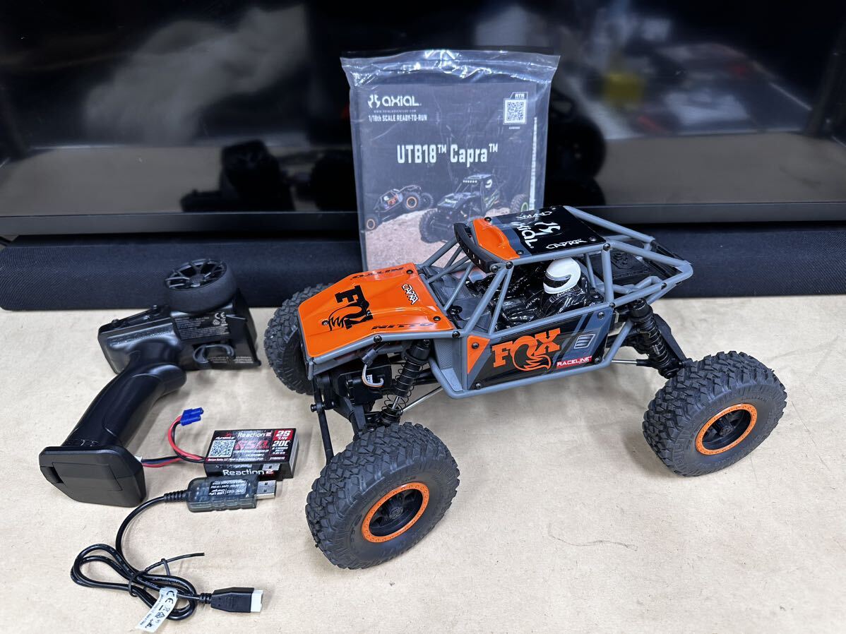 アキシャルAxial Horizon Hobby　1/18 UTB18 カプラ 4WD アンリミテッド トレイルバギー RTR Axial - （オレンジ）電動RC バギー _画像1