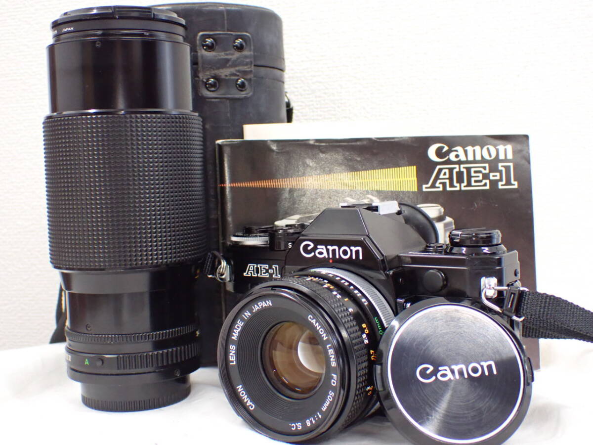 UH1586《1円》《シャッターOK》Canon キャノン AE-1 / FD 50mm F1.8 / FD 70-210mm F4 / 取説付_画像1