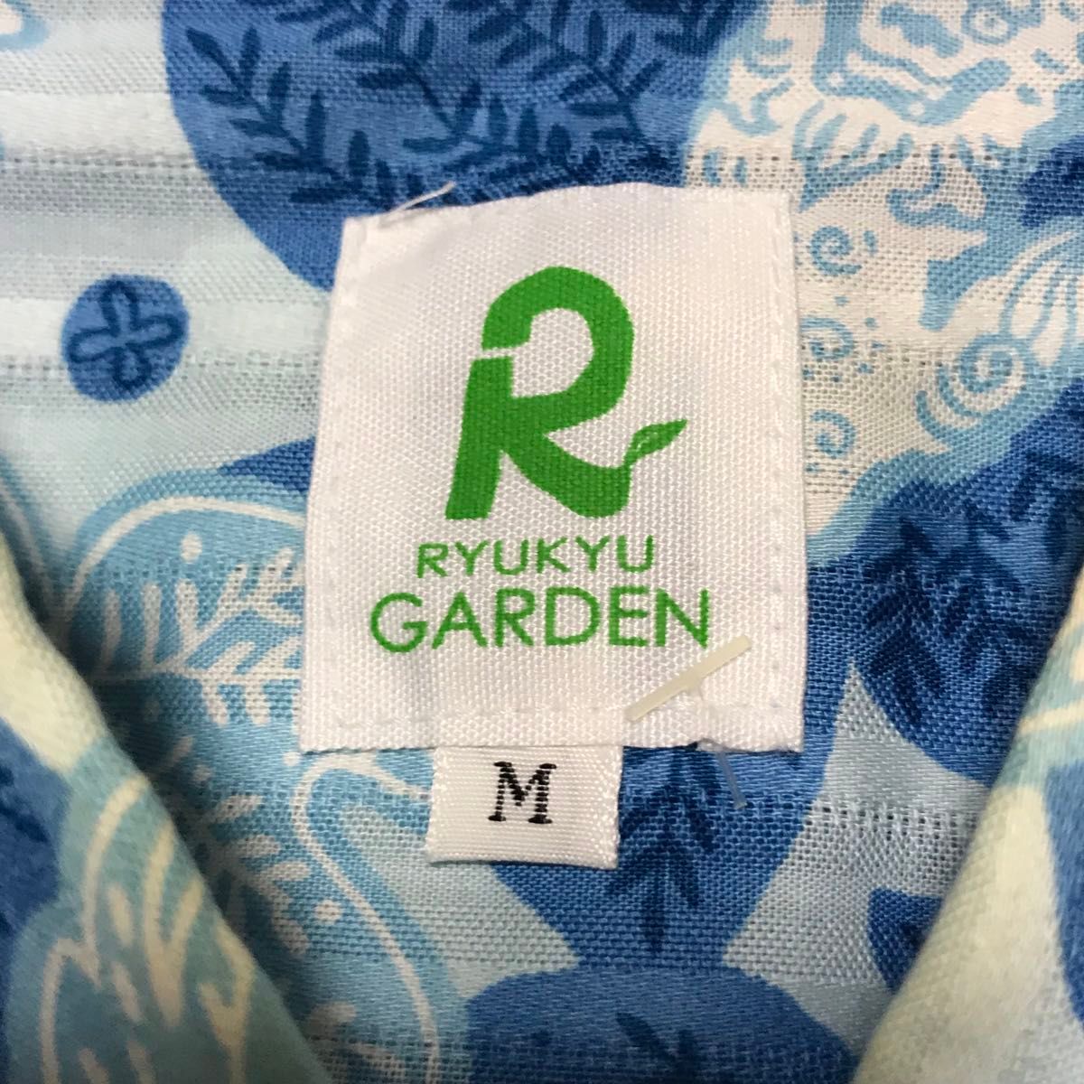 RYUKYU GARDEN かりゆしシャツ　M　半袖　花柄　総柄　青　アロハ　シーサー　日本製