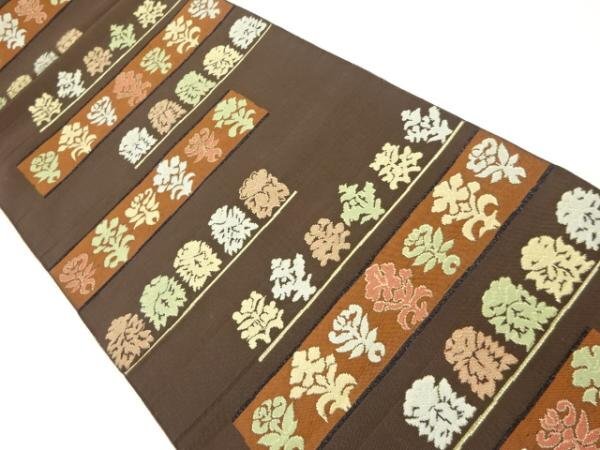086417# 【1円～】横段に抽象花模様織り出し名古屋帯の画像1