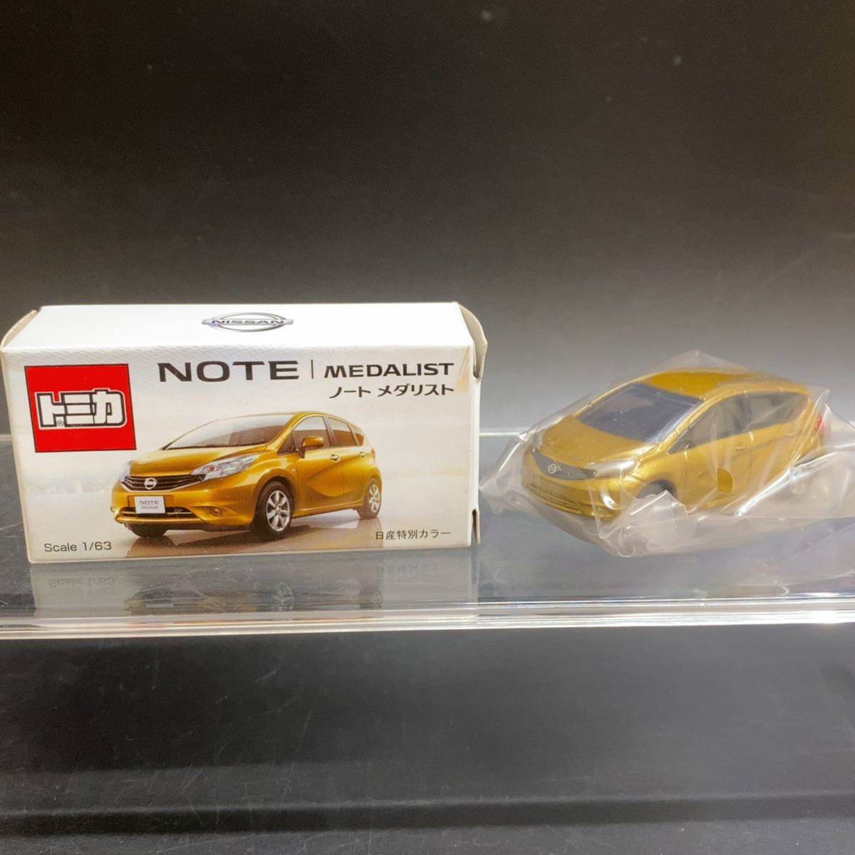 【未使用】トミカ 日産 NOTE MEDALIST ノート メダリスト 日産特別カラー 1/63 ゴールド 非売品 当時物 限定の画像1