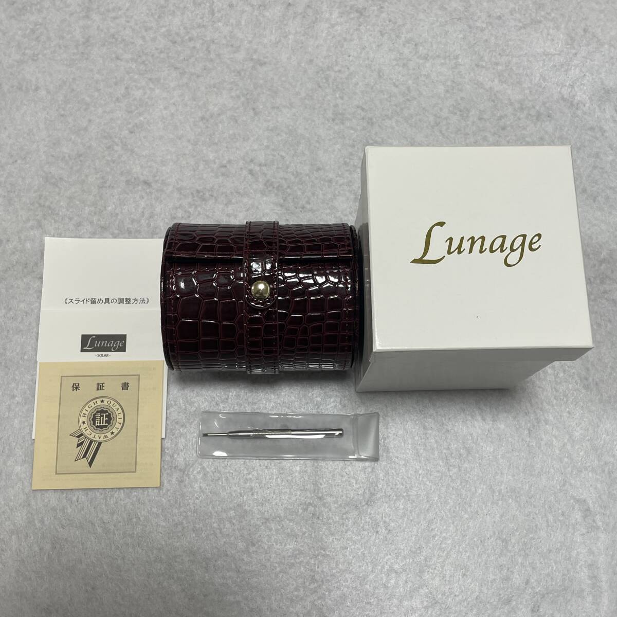 #9217 【未使用】Lunageルナージュ 旭ダイヤモンド 0.65ct ゴールドカラー ソーラー シェル文字盤 3針 現状可動の画像4