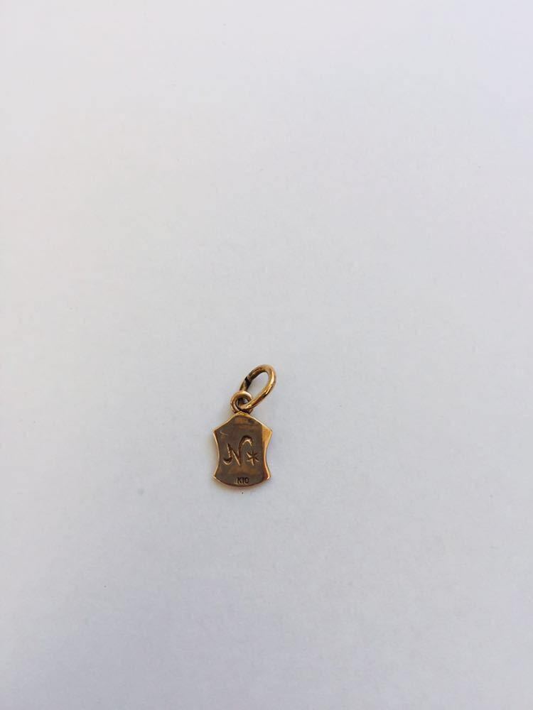 [ beautiful goods ] rare! antique design Nojess white enamel k10 Gold charm records out of production design pendant top head PG