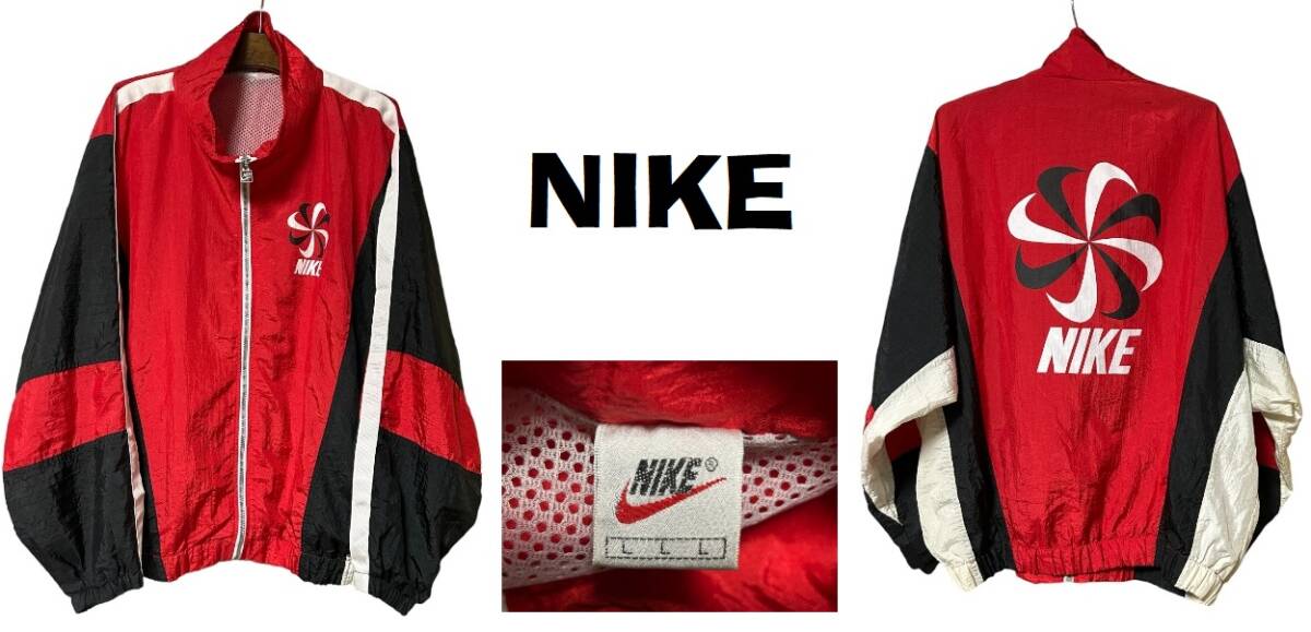 新品同然USA買付90年代ナイキNIKE風車ロゴ両面プリント・ナイロンジャケット★レッド★Lの画像1