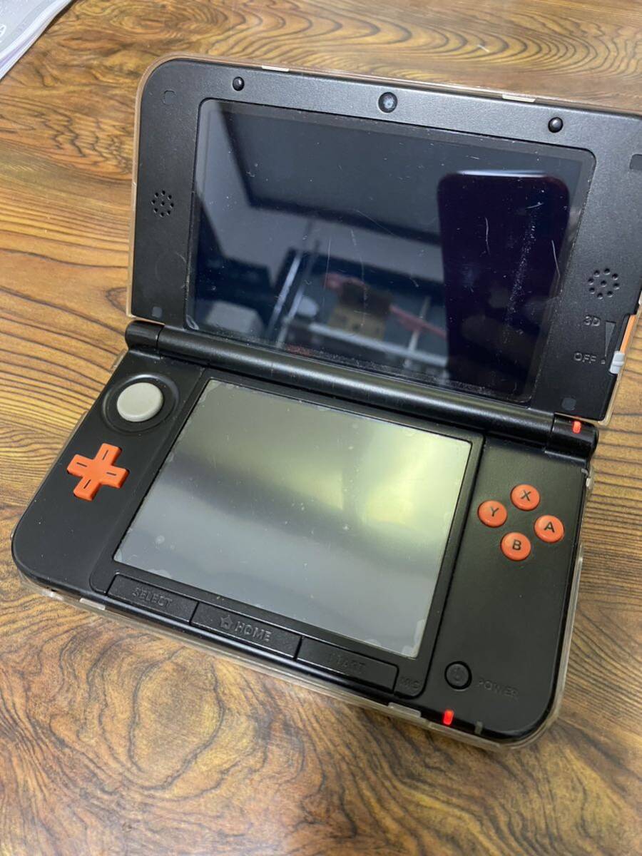 Nintendo 任天堂 ニンテンドー3DSLL オレンジ　ハードケース付き　通電のみ確認済み　ジャンク　現状品　_画像1