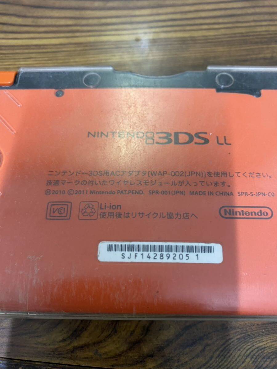 Nintendo 任天堂 ニンテンドー3DSLL オレンジ　ハードケース付き　通電のみ確認済み　ジャンク　現状品　_画像6