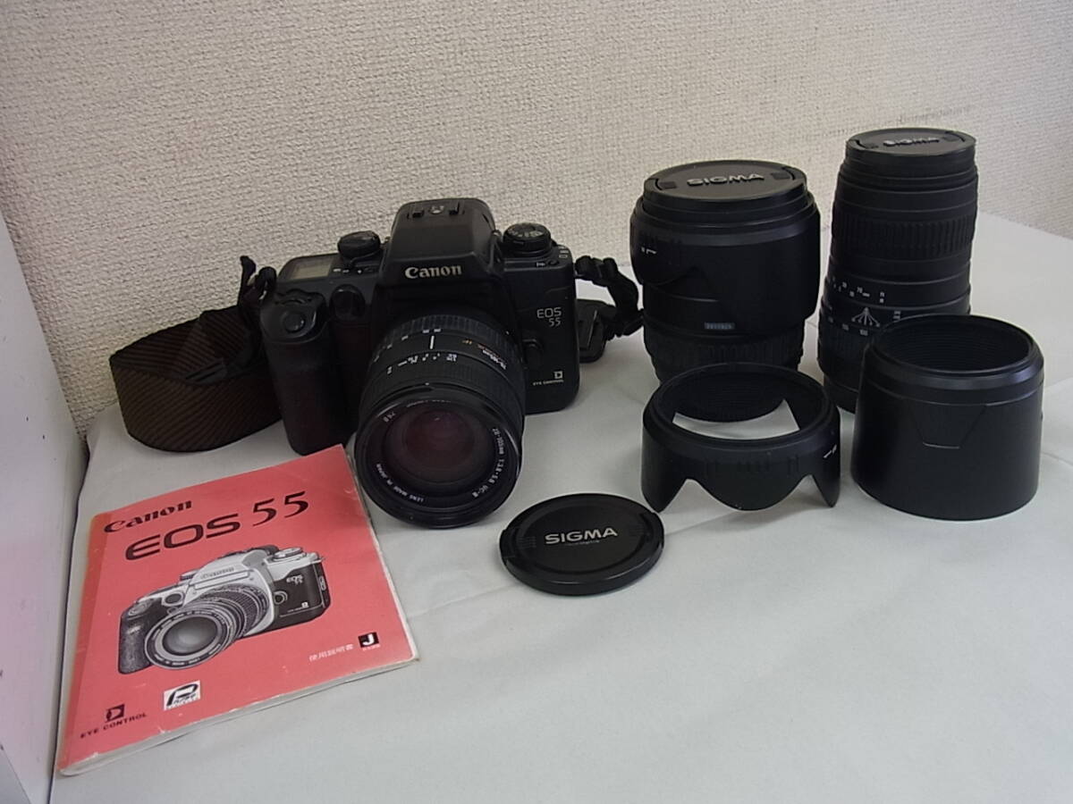 160414K13-0416K■キャノン Canon■EOS55 一眼レフ カメラ シグマレンズ×３本付 ジャンク扱い／中古品_画像1