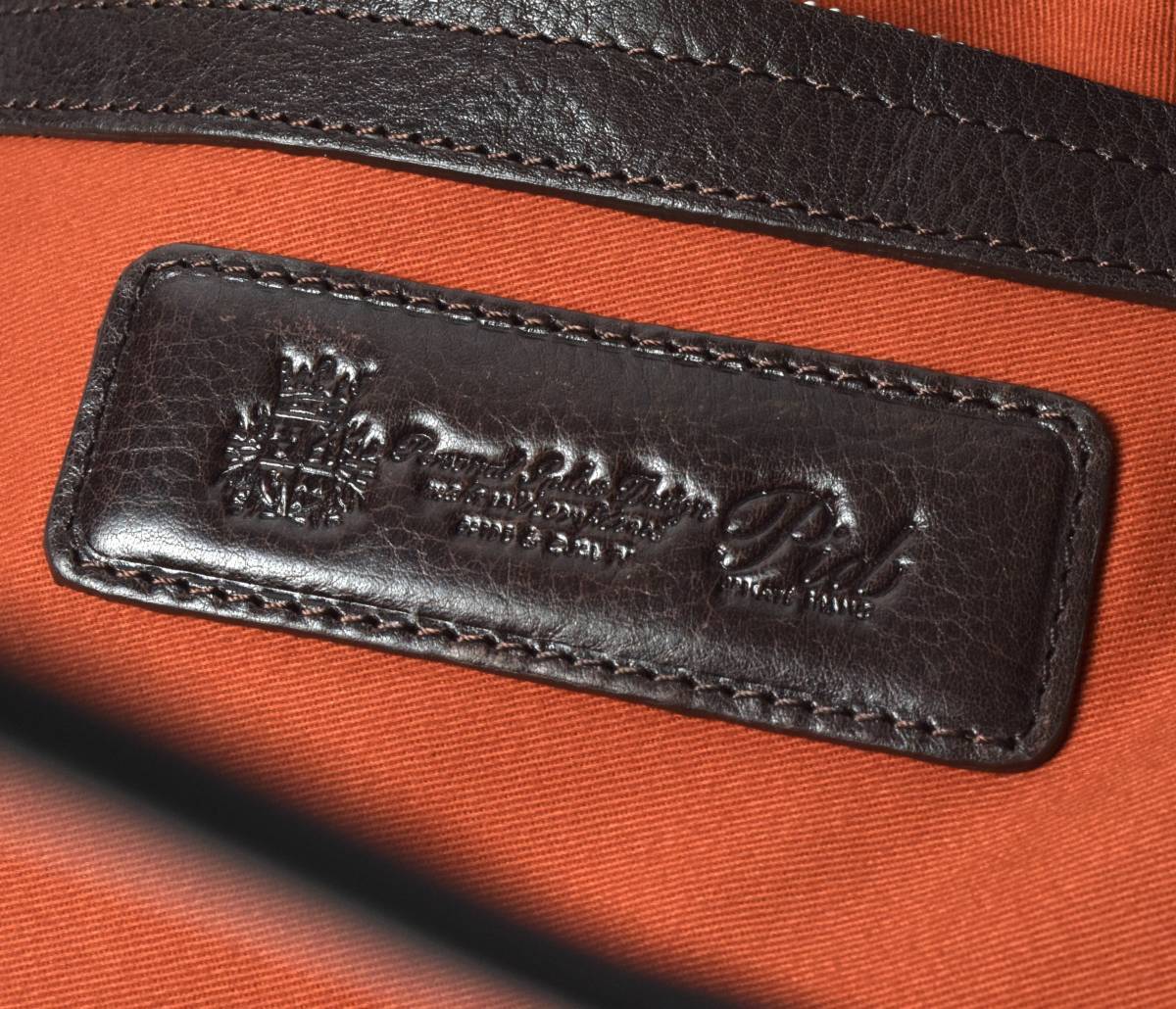  unused PIDpi- I ti-kau leather cow leather clutch bag steering wheel with strap . chocolate diamond stitch 