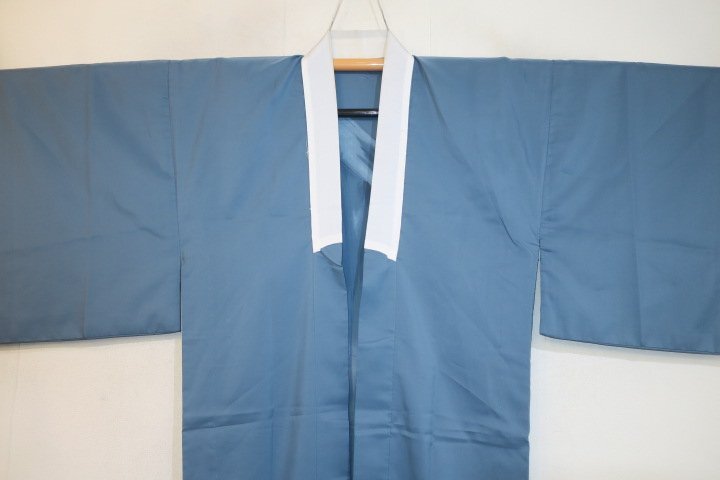.9381.. single . long kimono-like garment .68 height 129К light blue family laundry possibility white collar 