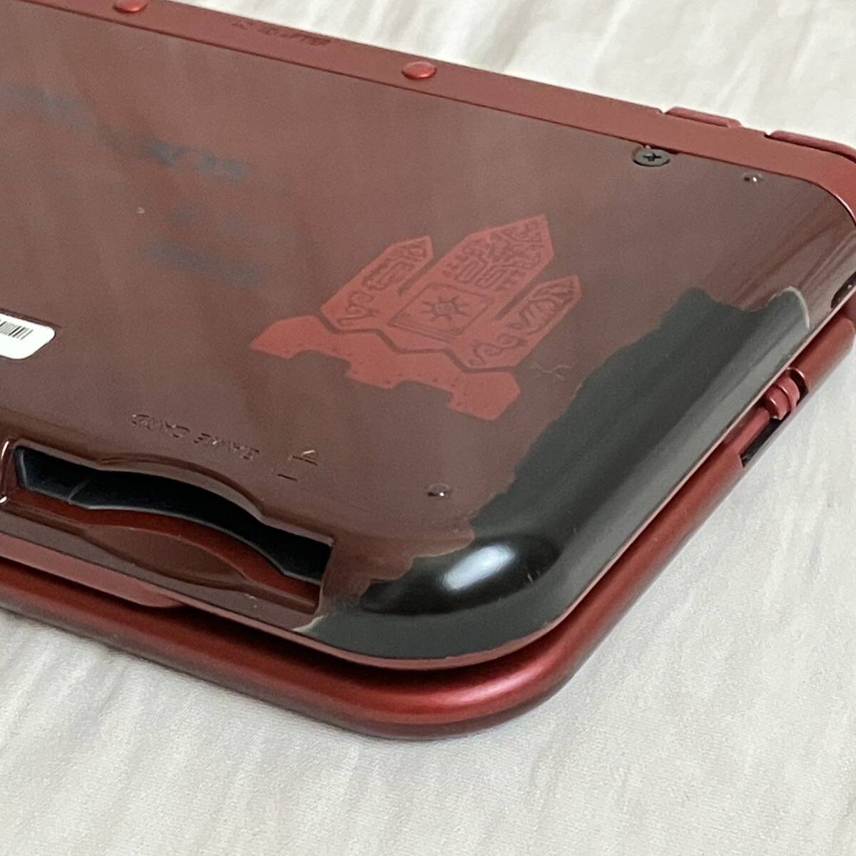 【動作確認済み中古】Newニンテンドー3DS LL 本体「モンスターハンタークロス スペシャルパック」箱＆ソフト付き_広範囲に塗装剥がれあり