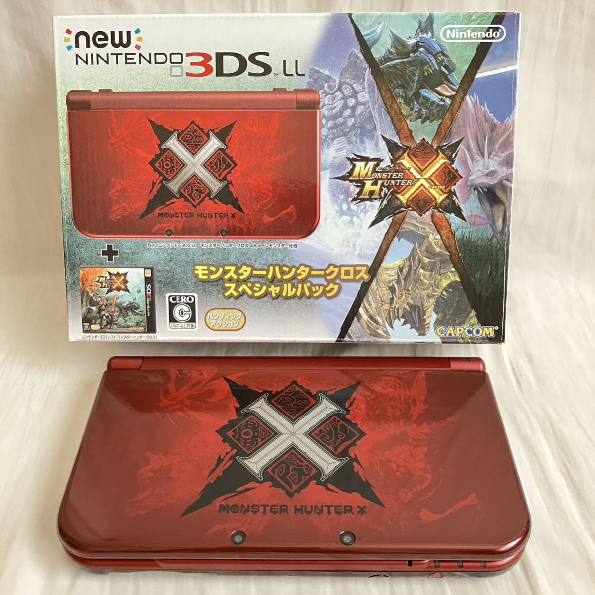 塗装剥がれあり【動作確認済み中古】Newニンテンドー3DS LL 本体「モンスターハンタークロス スペシャルパック」箱＆ソフト付き_画像1