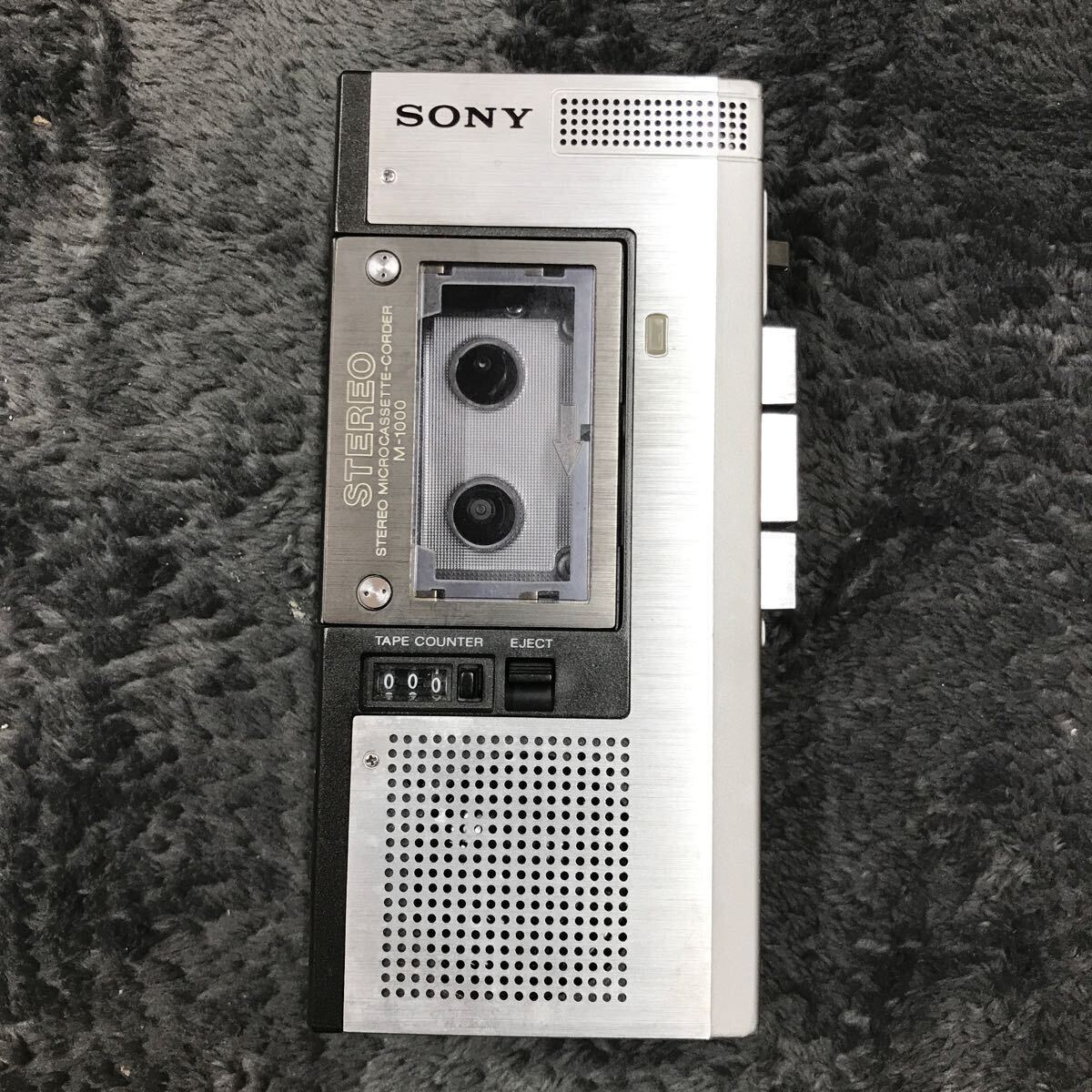 A04115 SONY stereo micro cassette-corder M-1000 ステレオ マイクロカセットコーダー 電池式 ジャンクの画像1