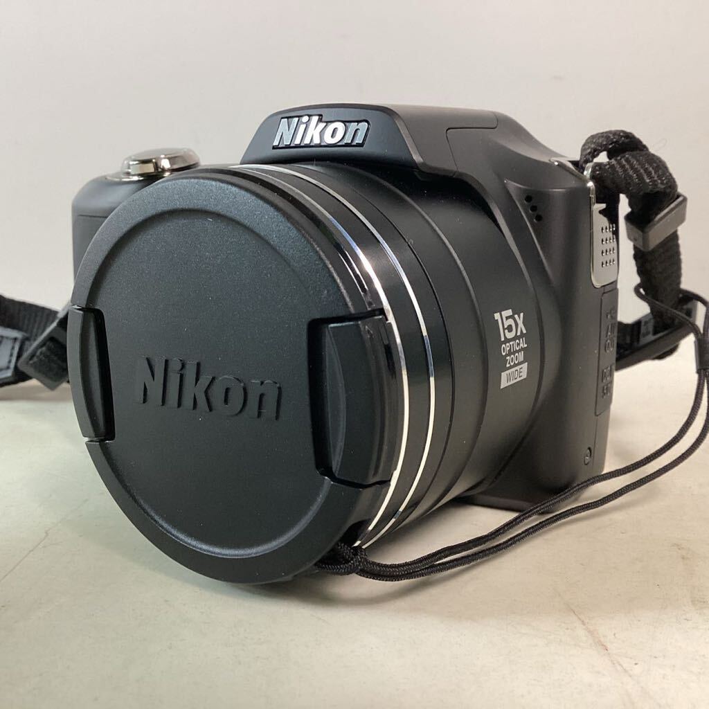 y437 Nikon コンパクトデジタルカメラ COOLPIX L100 高速連写 15倍ズーム 1000万画素 手ブレ補正 ニコン 箱 ケース付き 動作確認済 中古_画像3