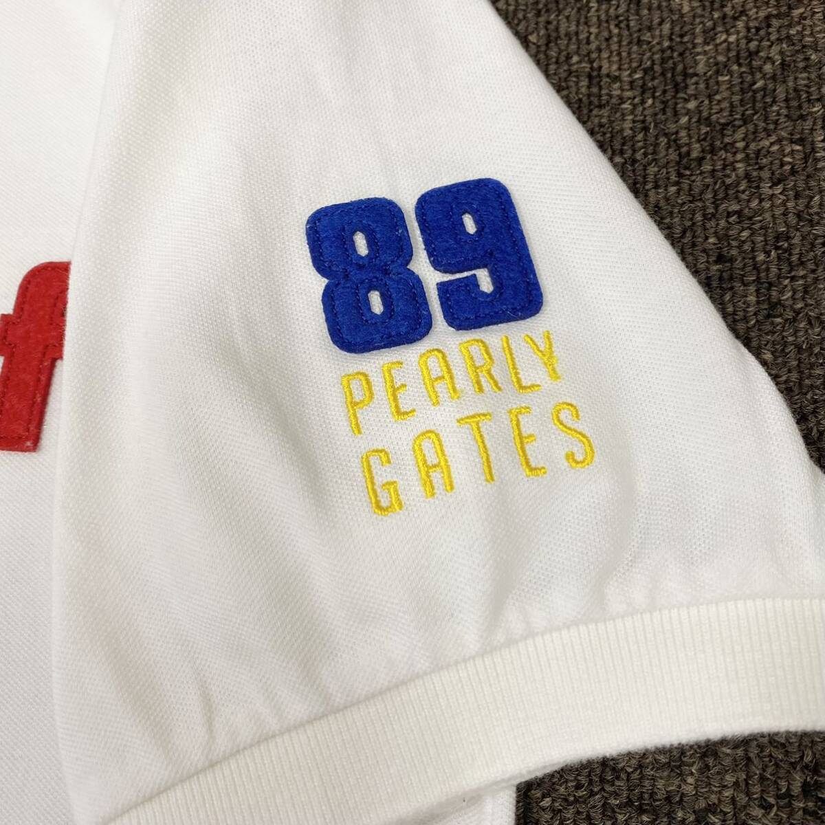 PEARLY GATES(パーリーゲイツ)半袖ポロシャツ アップリケロゴ 鹿の子 メンズ7 ホワイトの画像6