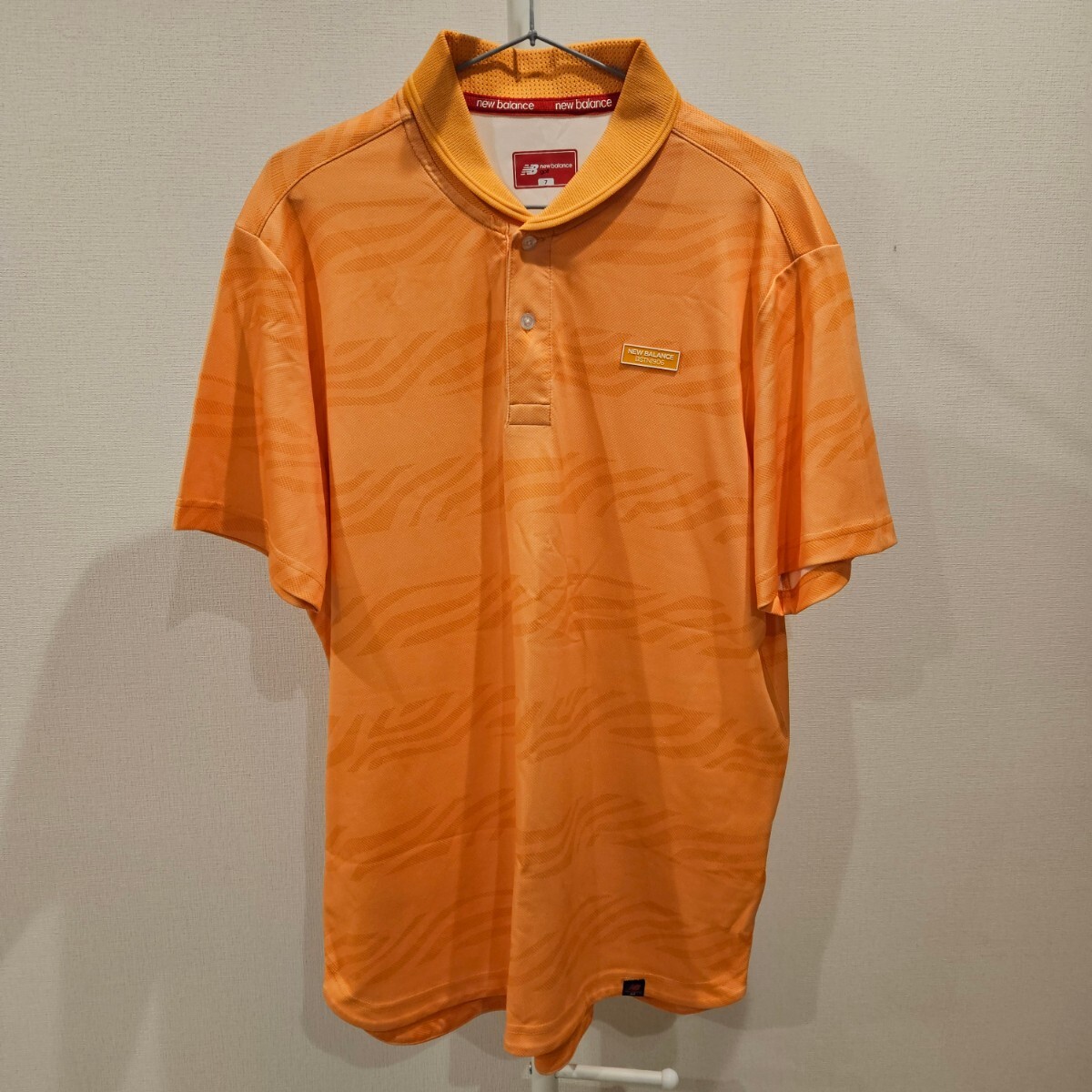 【送料無料】new balance golf ニューバランスゴルフ サイズ:7 半袖ポロシャツ ゴルフウェア オレンジ _画像1