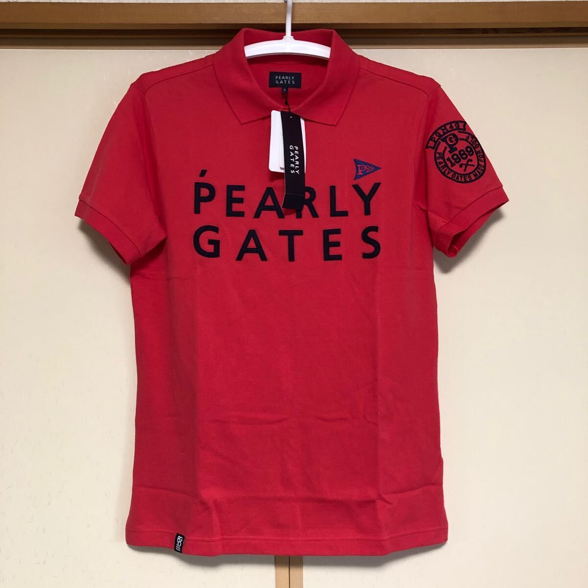 新品未使用PEARLY GATES半袖ポロシャツ　サイズ5 薄いレッド　送料無料_画像1