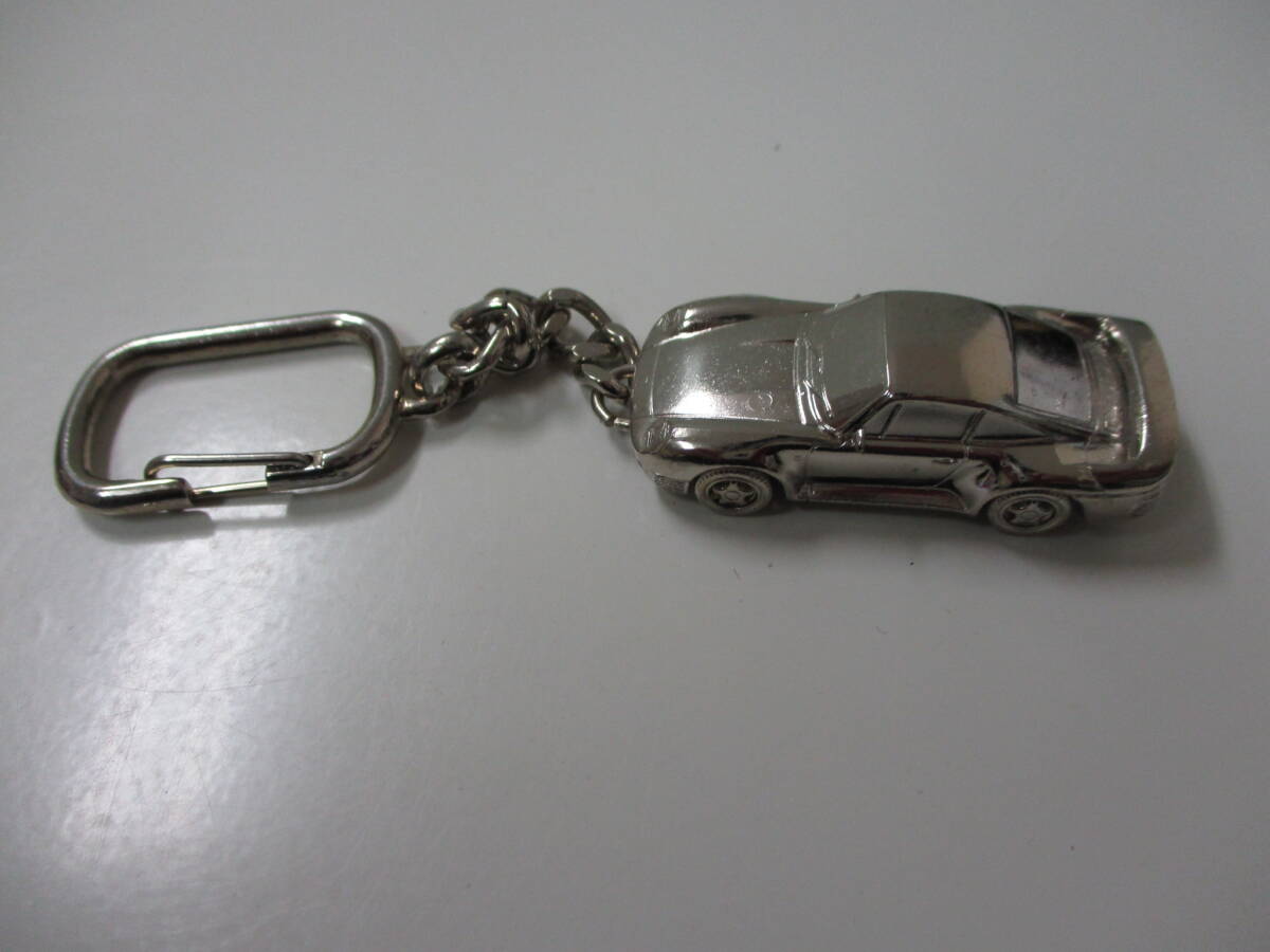 03M003* PORSCHE 959 1986 Porsche key holder brago BBurago 