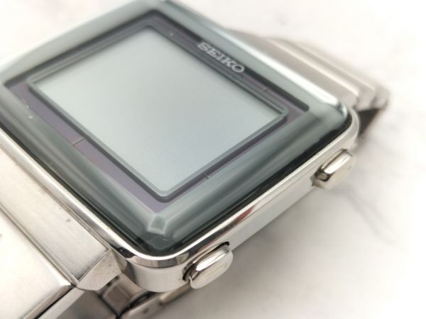 C134 1円～ ※不動品※ セイコー SEIKO スピリット S771-0AA0 デジタル ソーラー 腕時計 スクエア型 ステンレス シルバーカラー メンズ_画像8