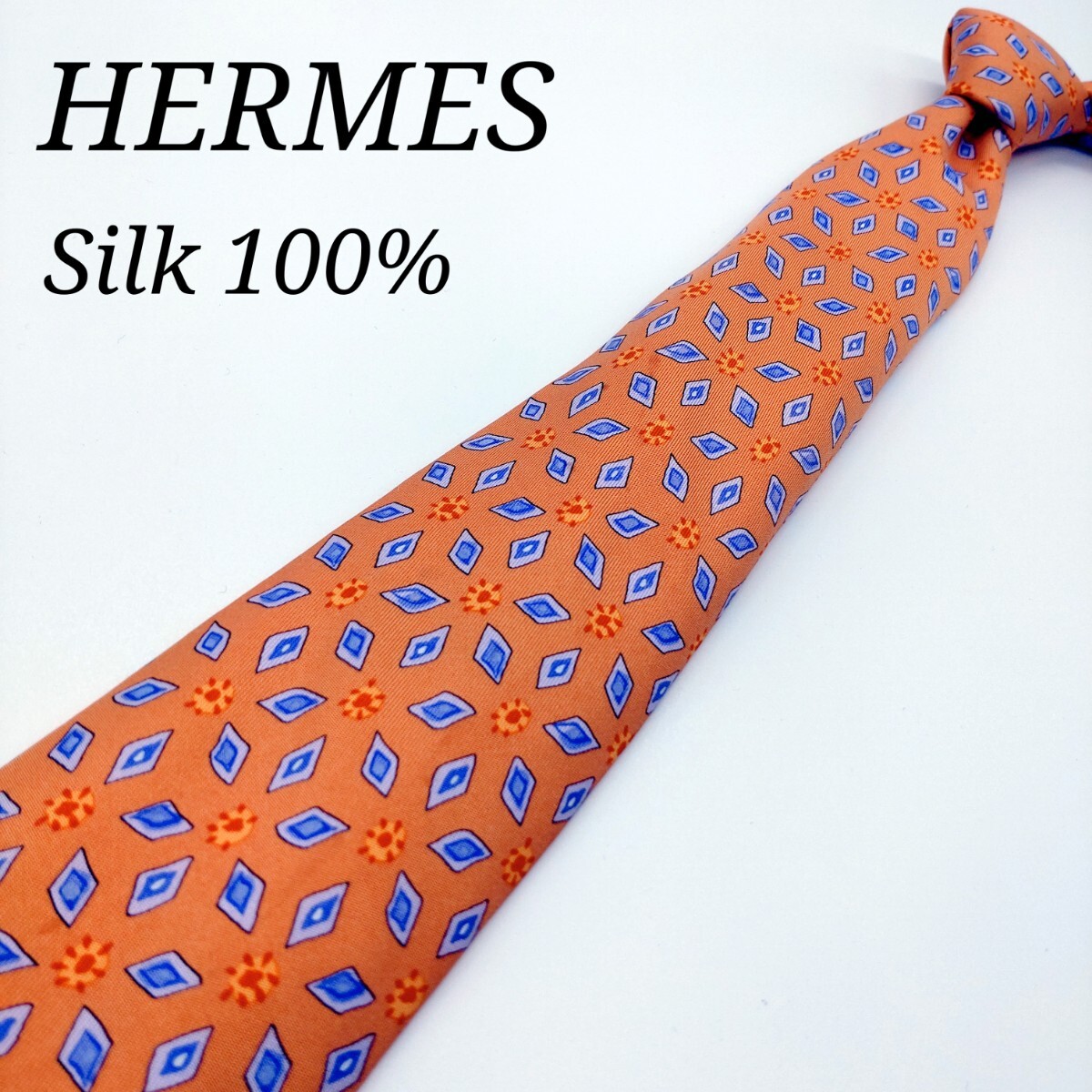 【圧倒的高級感】【紳士の嗜み】【大人のオシャレ】エルメス HERMES ネクタイ オレンジ色 シルク100% 総柄 ひし形 フランス製 ボタニカル柄_画像1