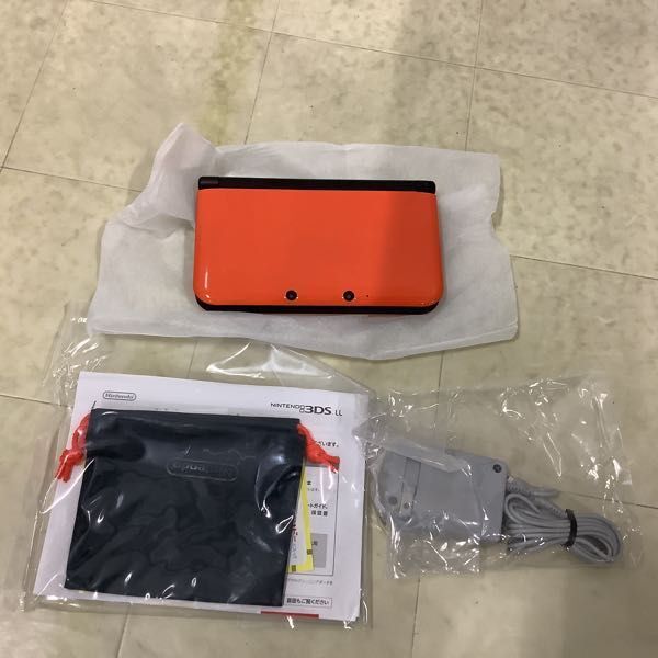 1 jpy ~ operation verification / the first period . settled Nintendo 3DS LL limited pack orange × black 