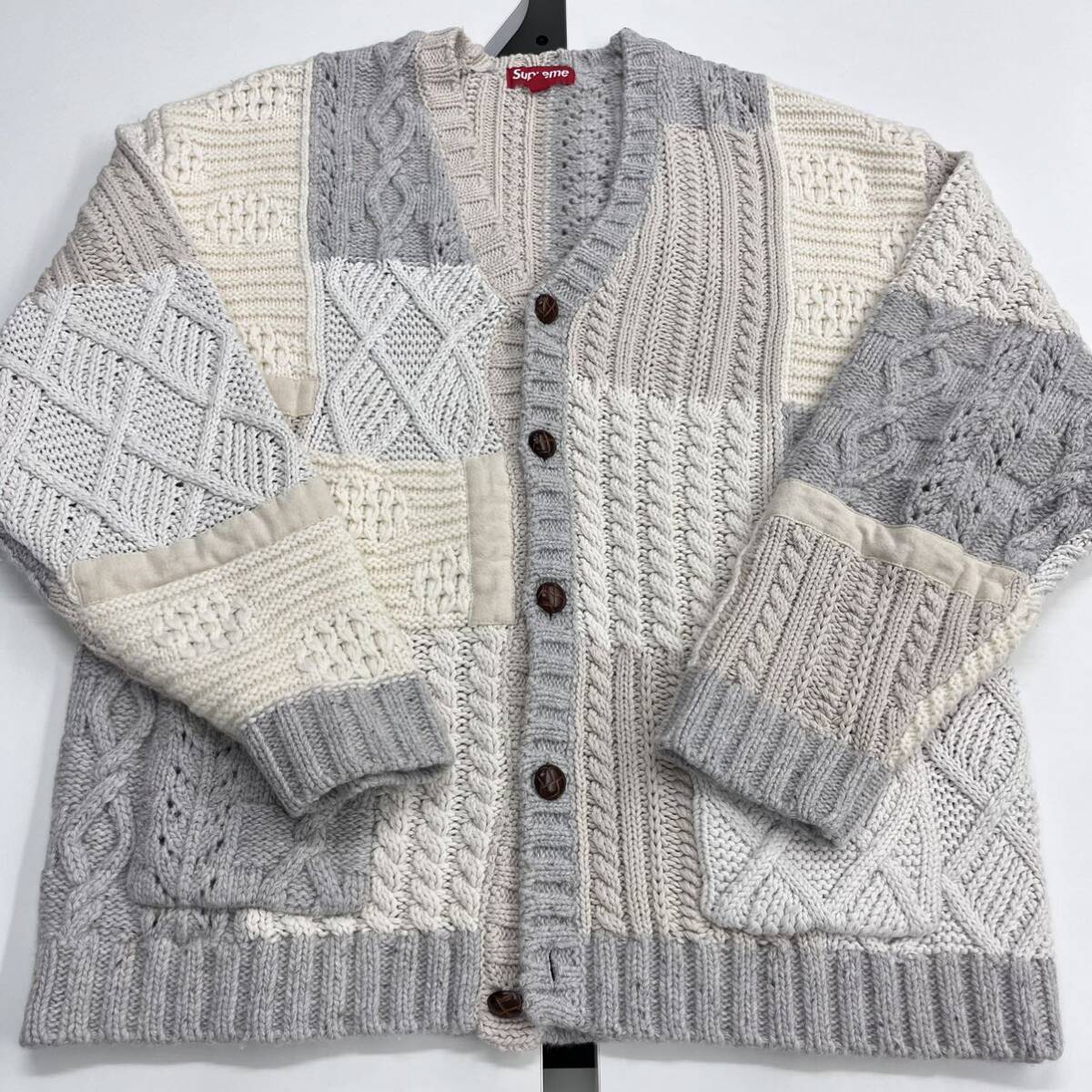 XL Supreme Patchwork Cable Knit Cardigan XL Supreme Patchwork Cable Knit Cardigan