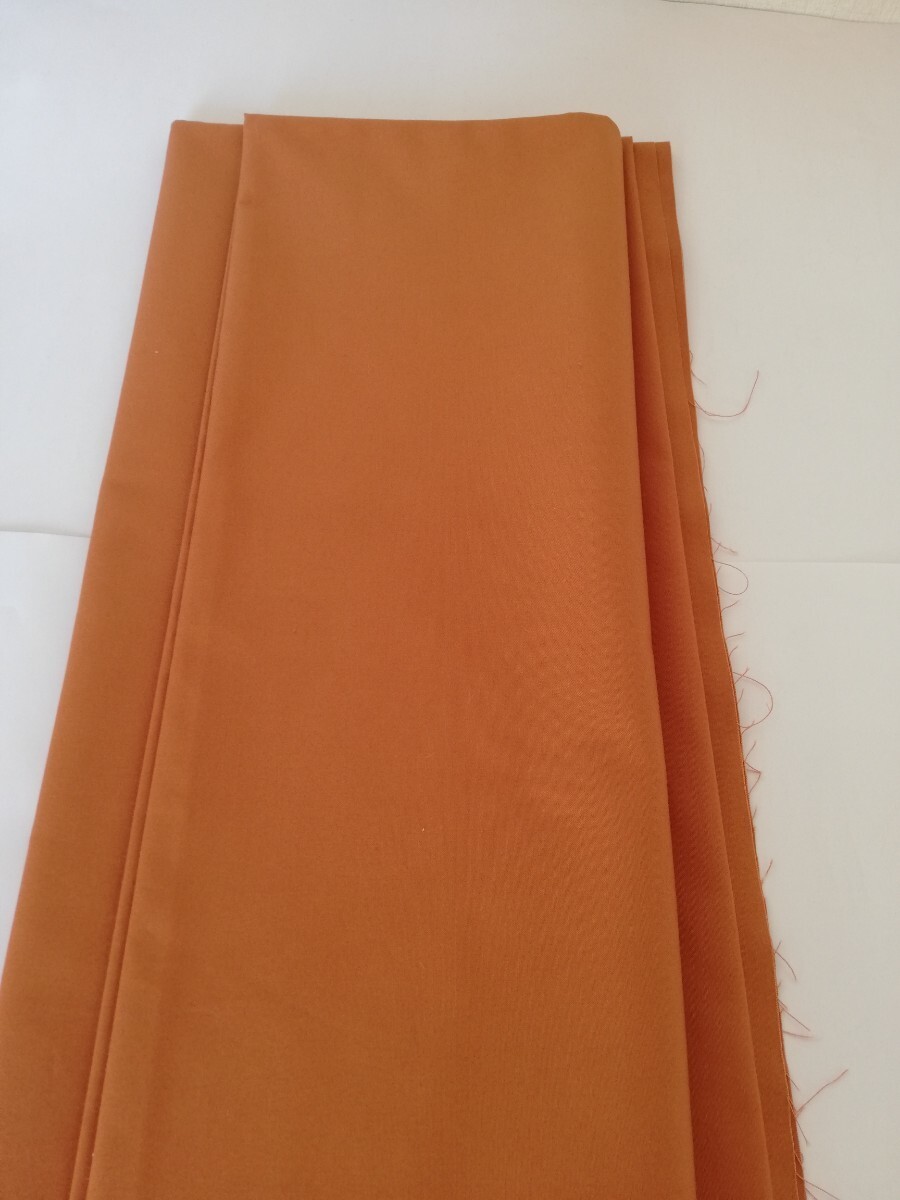 生地　オレンジ系　濃いオレンジ色　長さ2.5m 巾112cm 綿混　無地　日本製