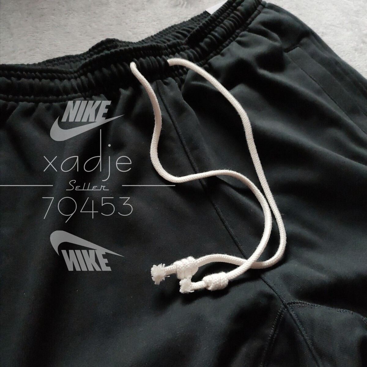 新品 正規品 NIKE STANDARD ISSUE ナイキ スウェットパンツ ジョガーパンツ テーパード 両足 ロゴ プリント 黒 ブラック XL_画像6