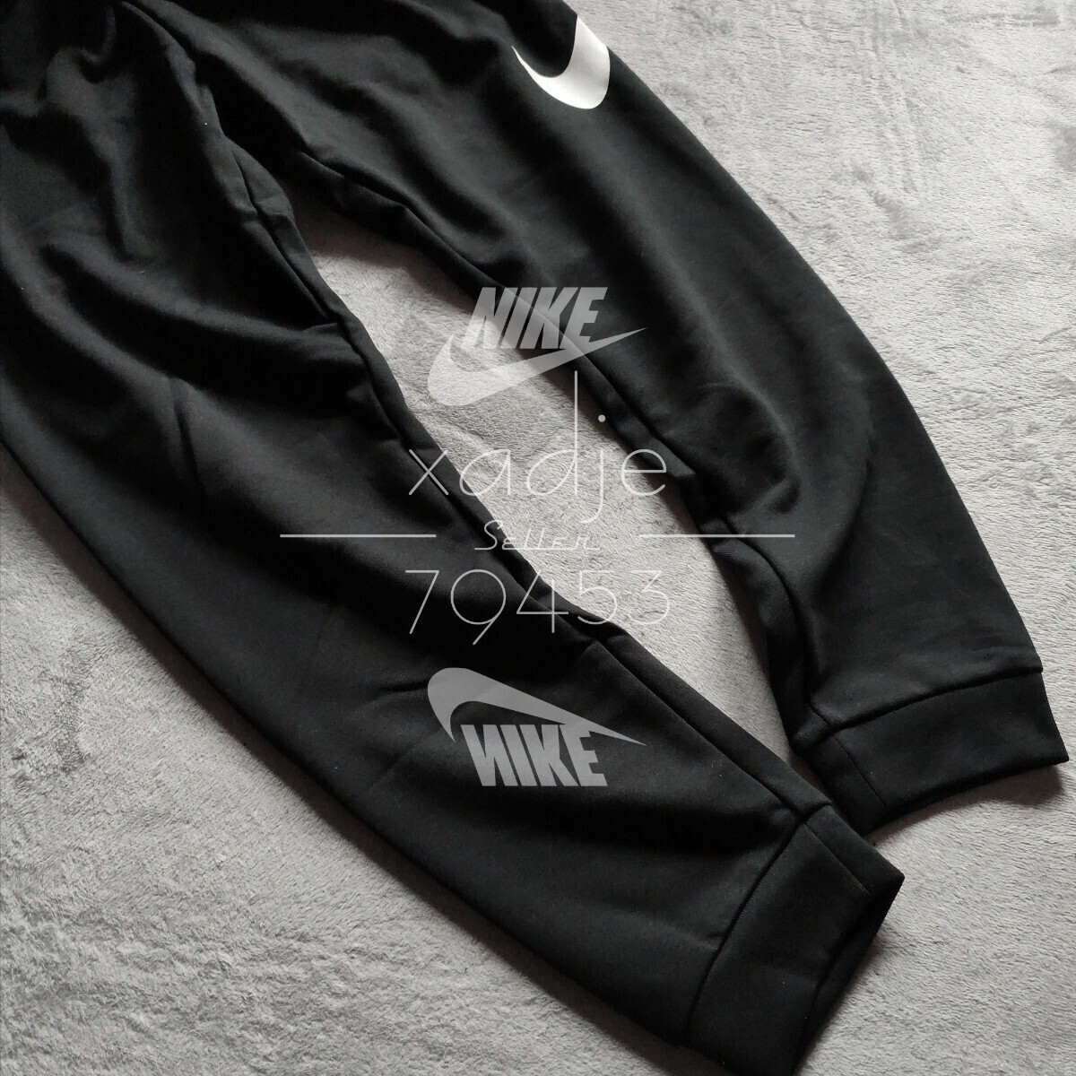 新品 正規品 NIKE DRI-FIT ナイキ ドライフィット スウェットパンツ ジョガーパンツ テーパード スウッシュ プリント 黒 ブラック Mの画像6