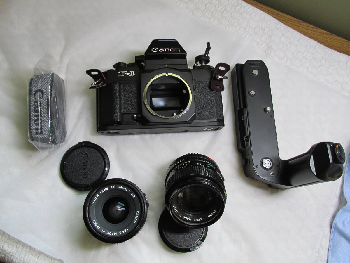 中古動作品 Canon キャノン New F-1＋ワインダー＋レンズNFD50㎜F1.4 ＋広角レンズNFD28㎜F2.8の画像1