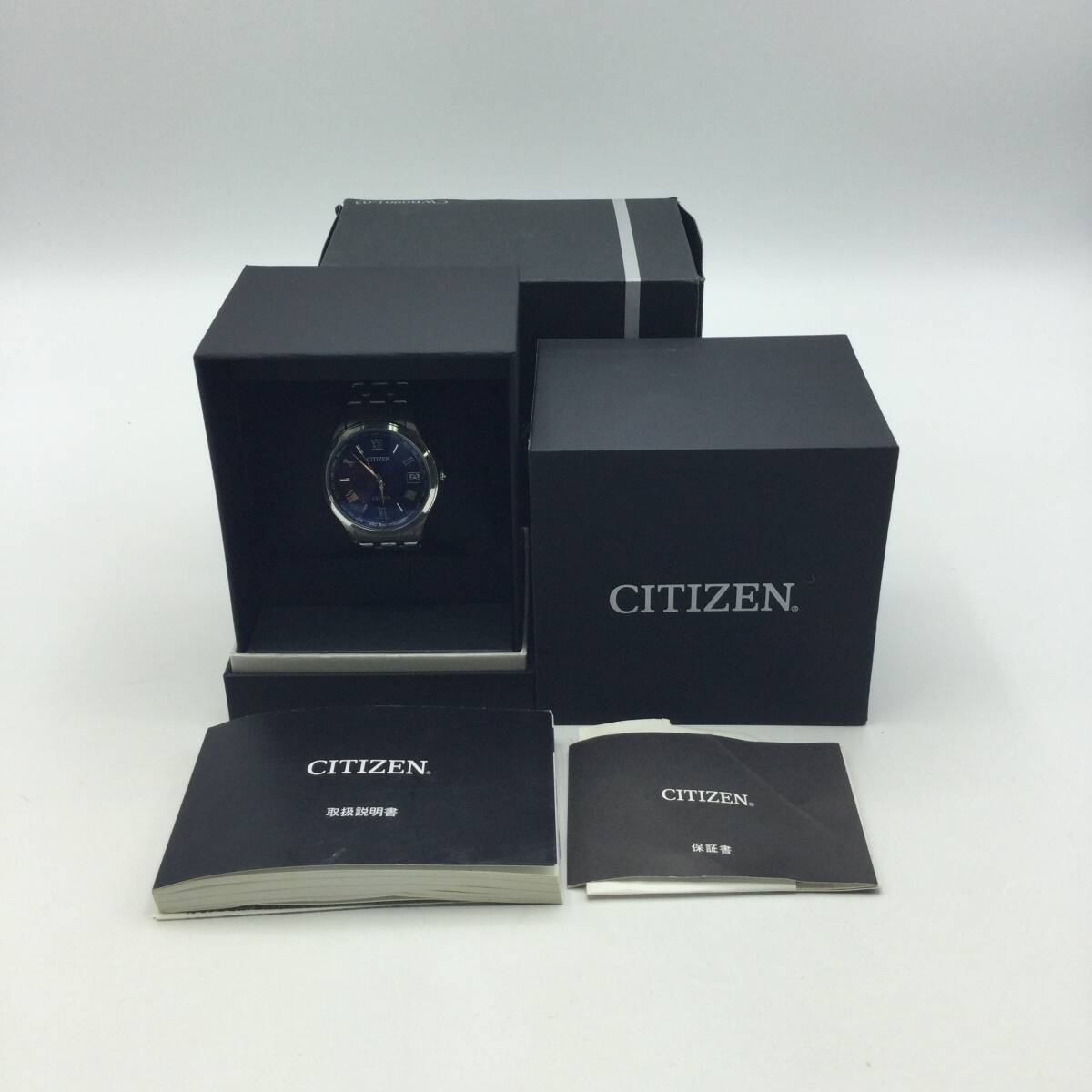 HH11◇＜ソーラー/稼働＞腕時計 CITIZEN シチズン H149-T021727 EXCEED エクシード 電波ソーラー デイト 青文字盤 ケース付き 現状品 ◇_画像1