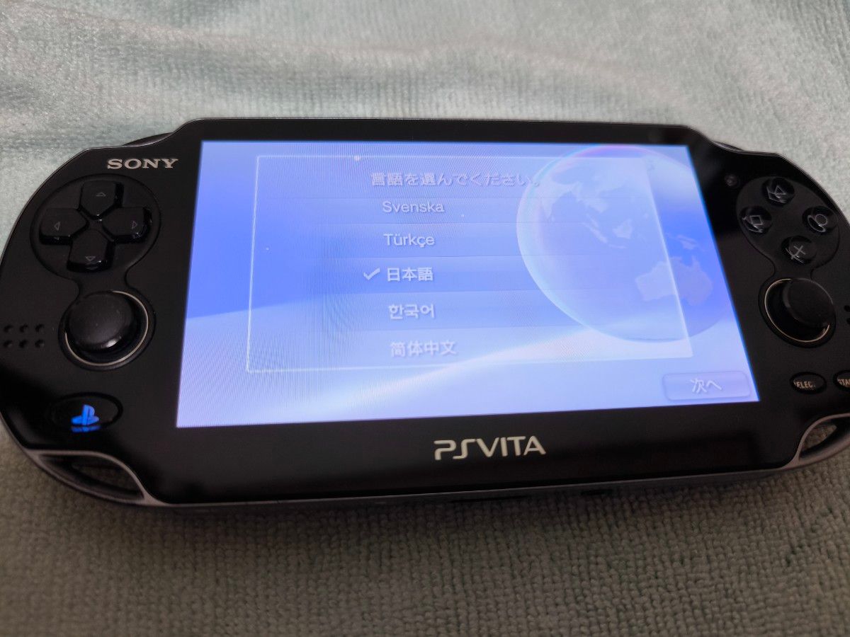 【ジャンク品】ケース付き PlayStation Vita 1100  クリスタルブラック 