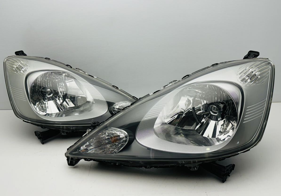 美品 ホンダ フィット GE6 GE7 GE8 前期 純正 HID ヘッドライト フィット RS 左右セット STANLEY P6869 バラスト付き 刻印7 (R141)の画像1