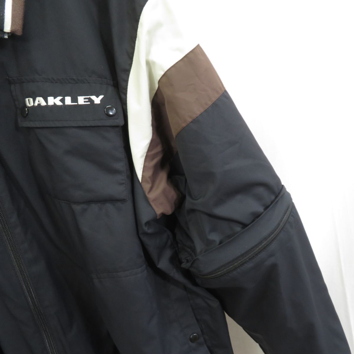 OAKLEY water-repellent 2way reverse side nappy Wind breaker jacket Golf wear sizeXL/ Oacley 0404