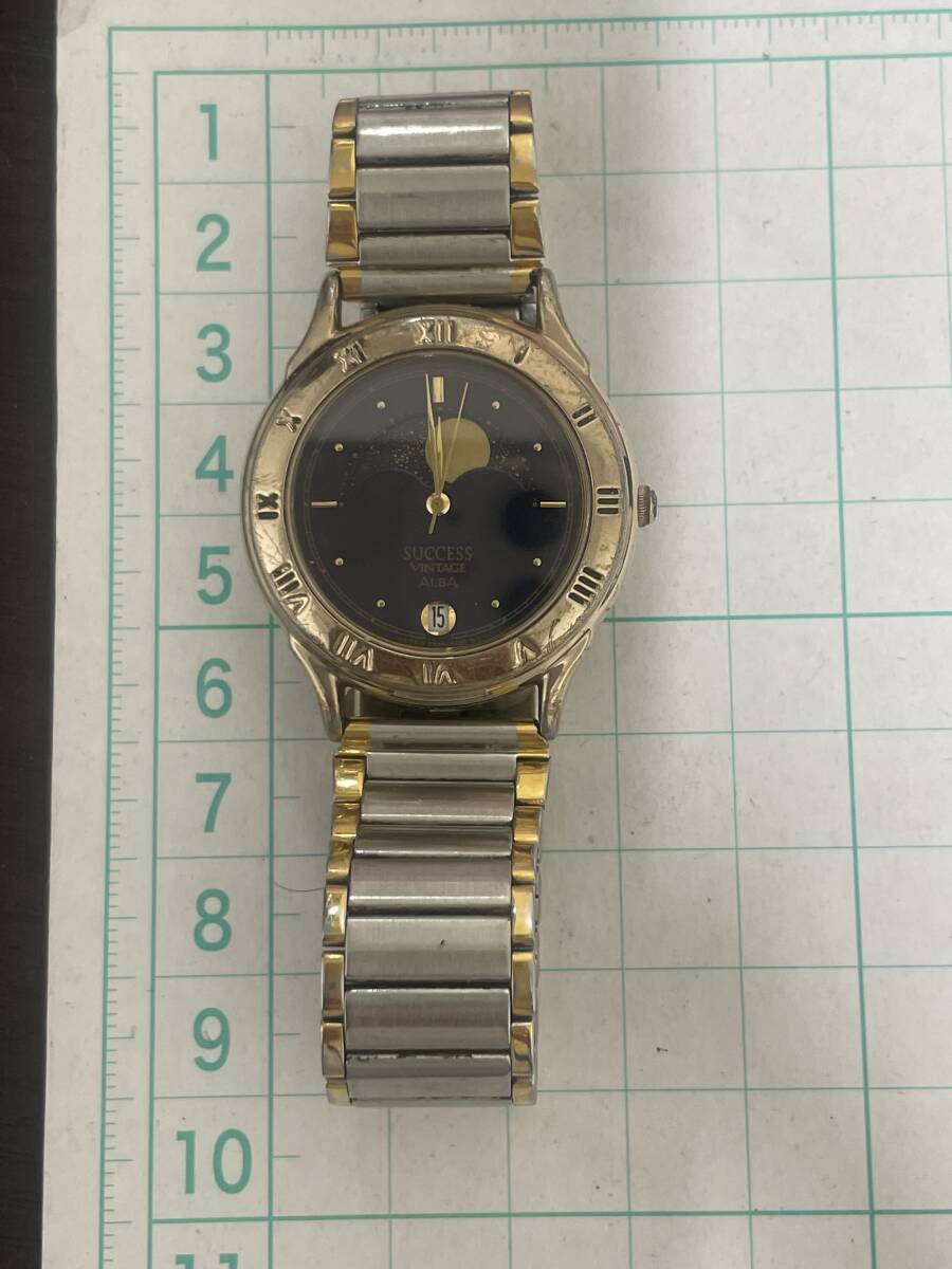 ALBA SUCCESS ムーンフェイズ 腕時計 紺文字盤 ゴールドベゼル 電池切れの画像5