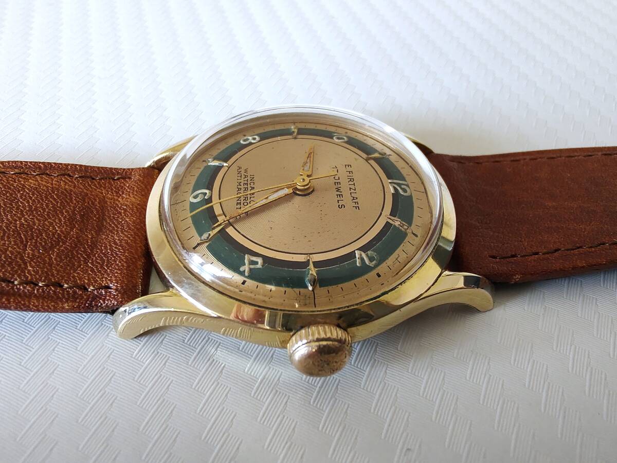 *E.FIRTZLAFF old hand winding type wristwatch for man gold color 