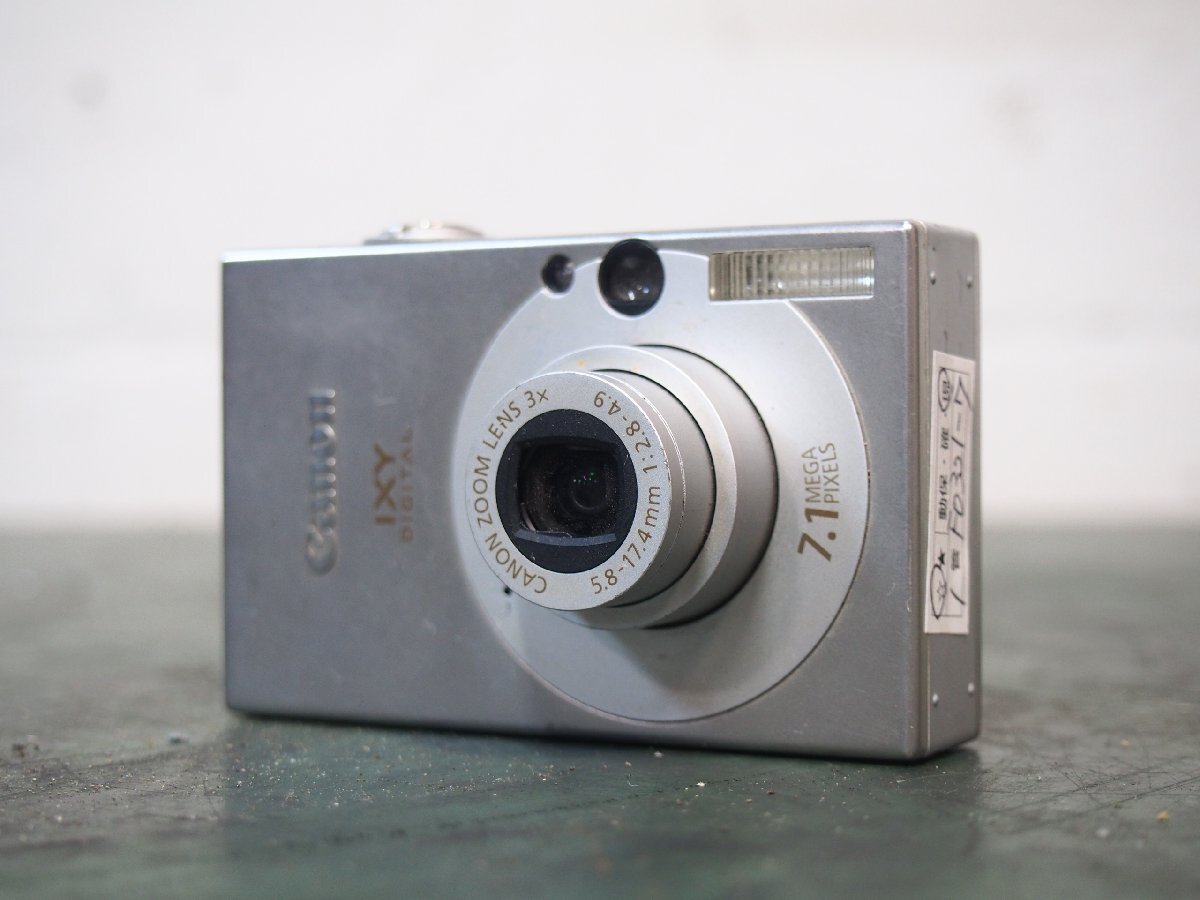 ☆【1F0321-7】 Canon キヤノン コンパクトデジタルカメラ PC1228 IXY DIGITAL ジャンク_画像1