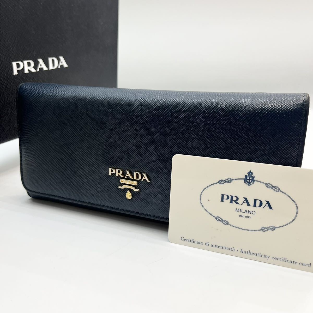 1円《美品》PRADA プラダ オーガナイザー トラベルケース ビジネス 長財布 大容量 ロゴ型押し レザー ネイビー メンズ レディース 高級感 の画像1