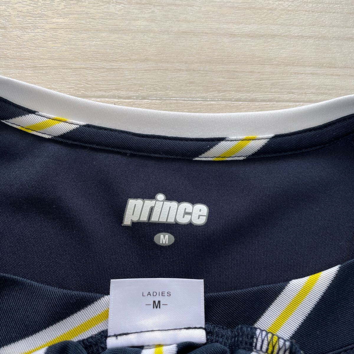prince Prince женский теннис одежда выставить верх и низ в комплекте игра рубашка юбка темно-синий темно-синий размер M прекрасный товар 