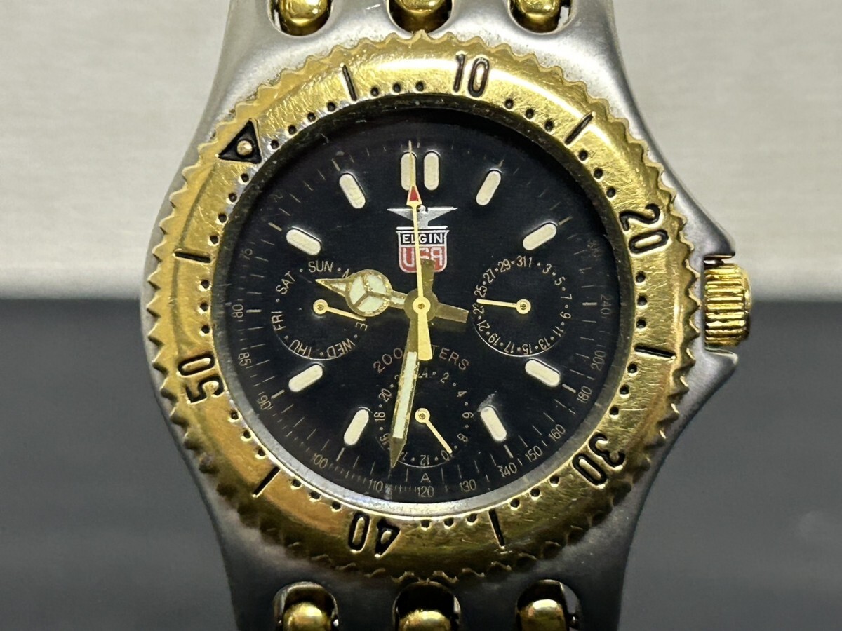 A2　ELGIN　エルジン　FK-527-A　黒文字盤　メンズ腕時計　ブランド腕時計　現状品_画像1