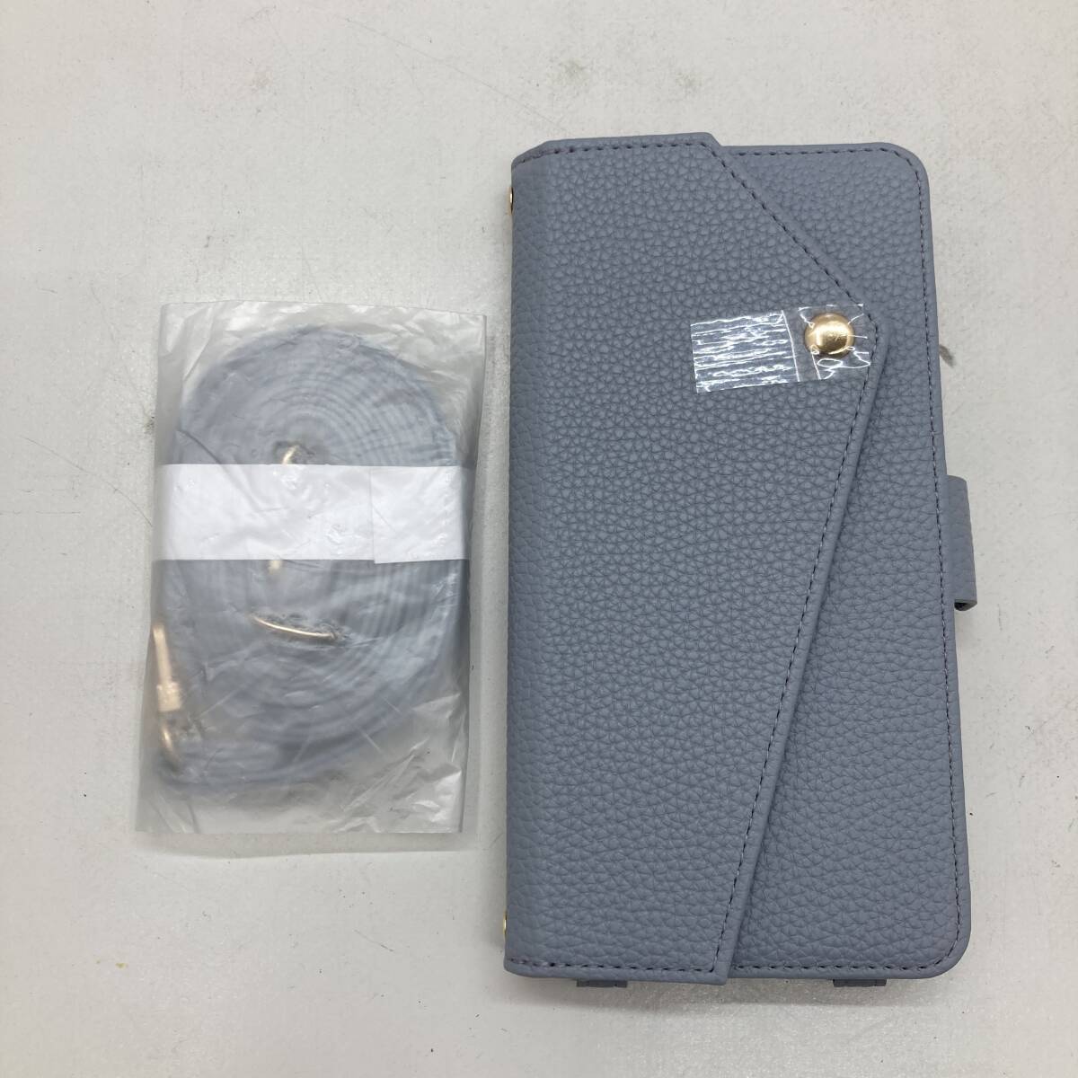 【1円～】elegante スマホケース 水色 手帳型 スマホアクセサリー レディース【中古品】の画像1