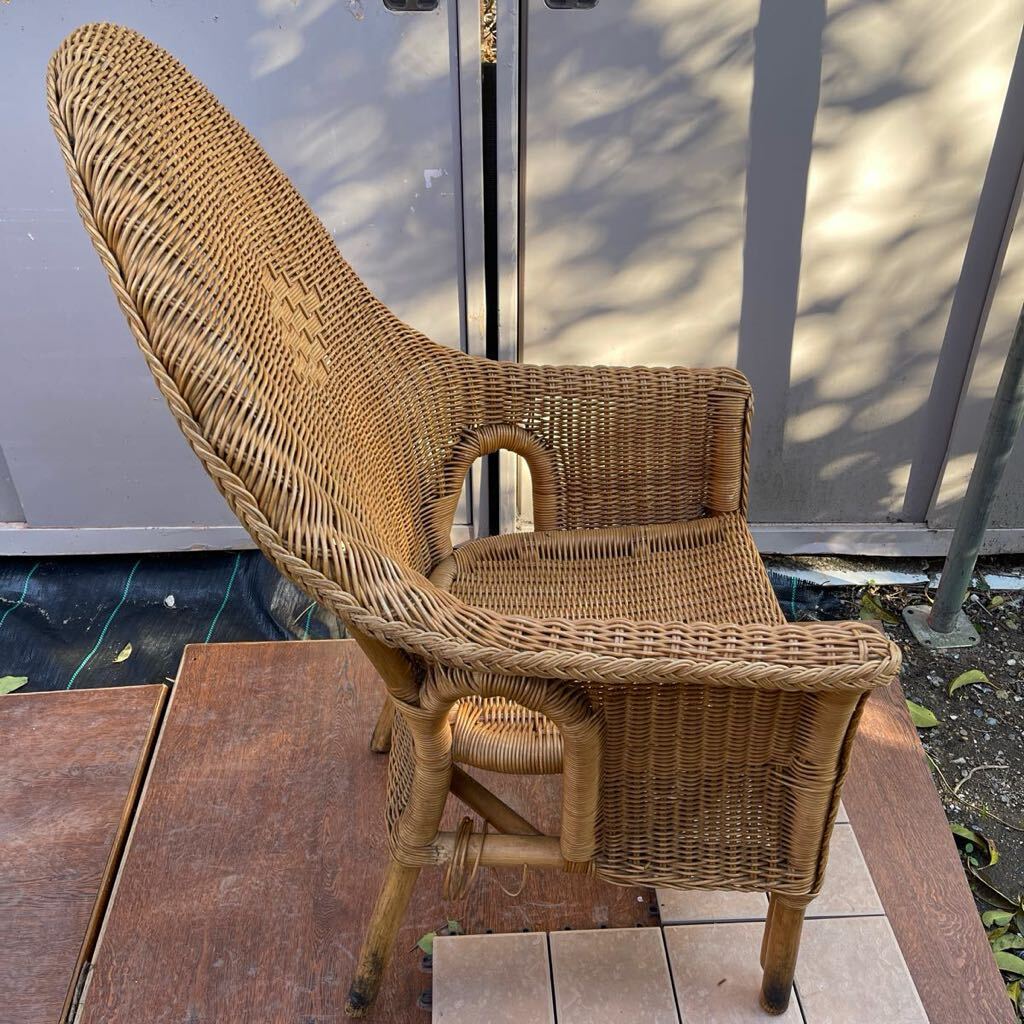  rattan arm chair - height approximately 105. width approximately 60. bearing surface under approximately 43.u-2