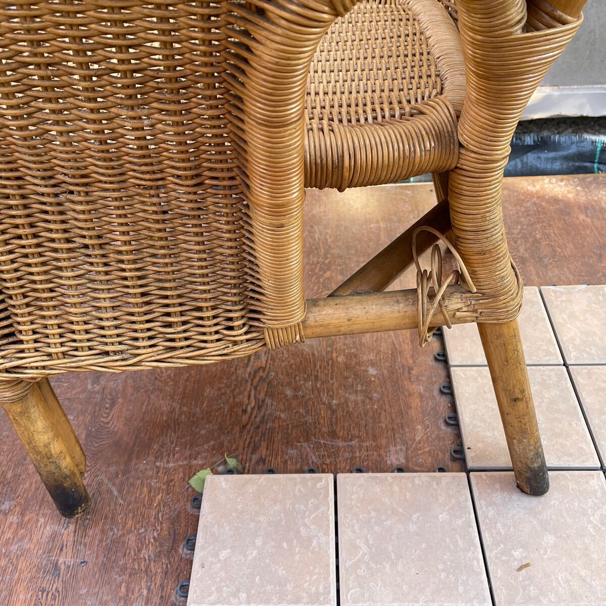  rattan arm chair - height approximately 105. width approximately 60. bearing surface under approximately 43.u-2