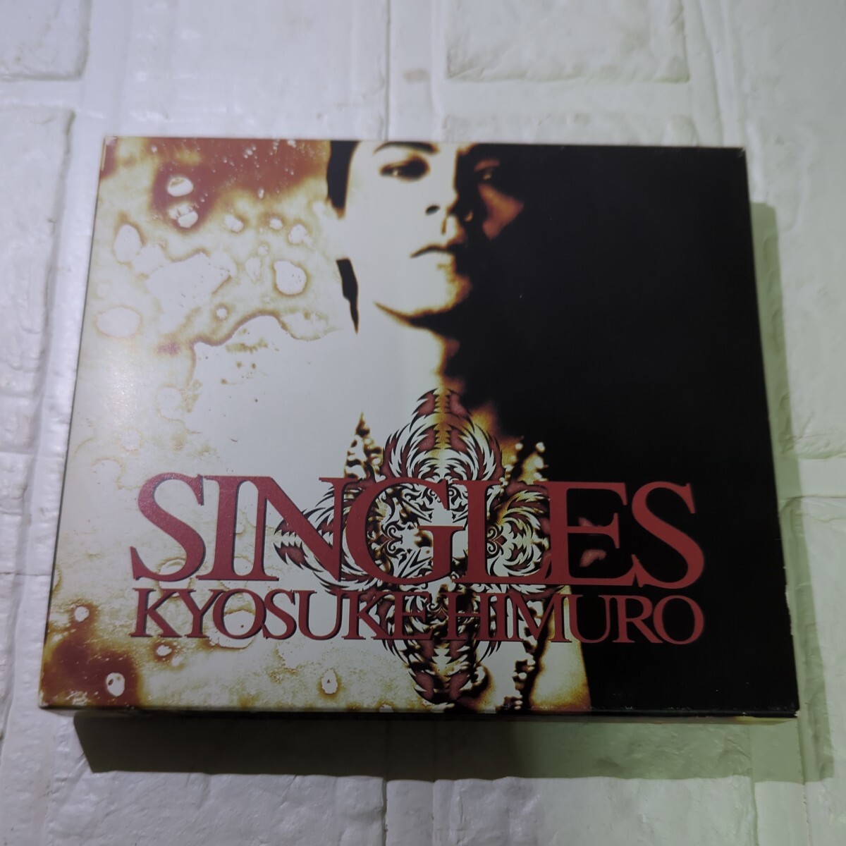 氷室京介 SINGLES　スリーブケース付ブックレット付_画像1