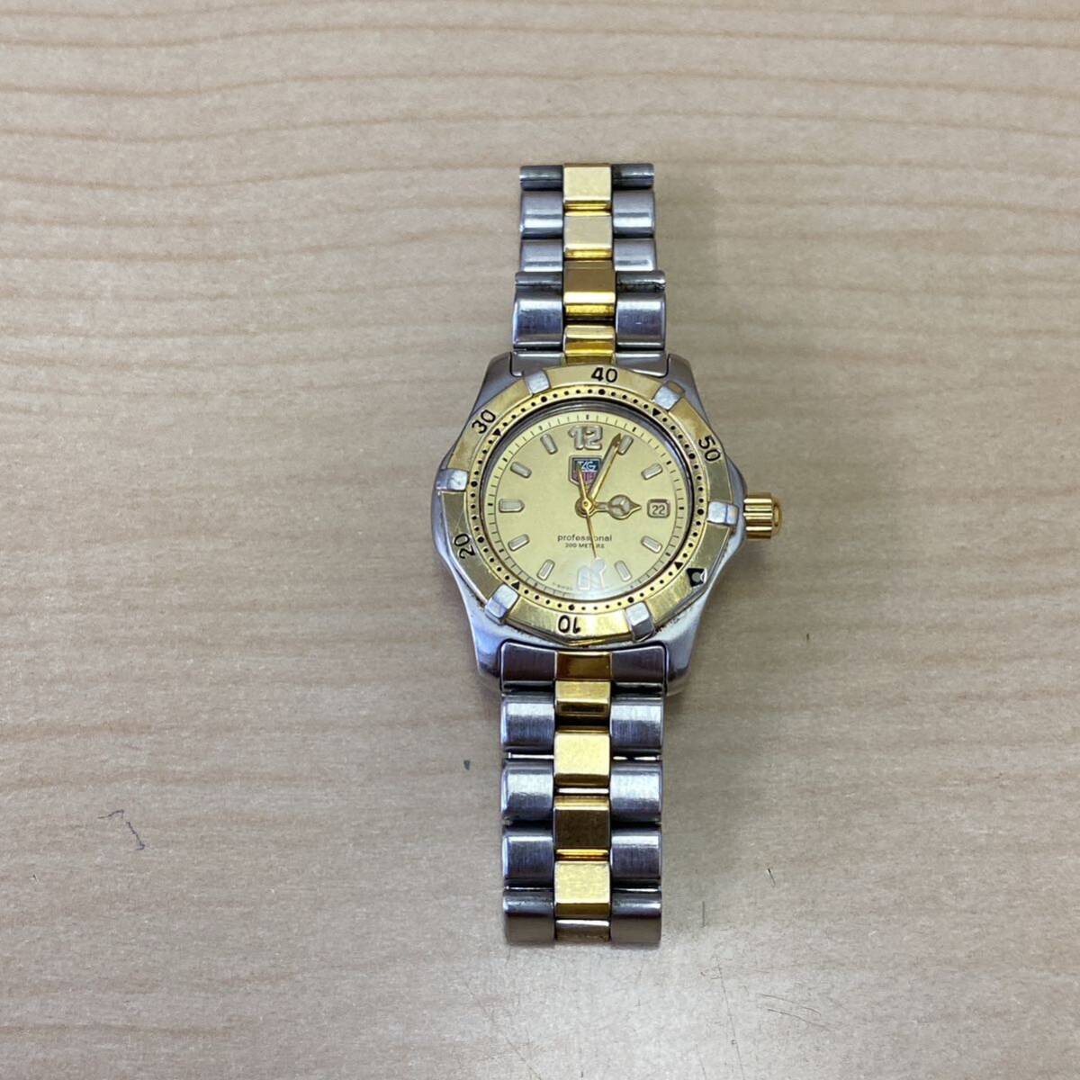 【TM0419】TAGHEUER タグホイヤー プロフェッショナル WK1321 腕時計 クォーツ 現状稼動品 シルバーカラー ゴールドカラー キズ汚れありの画像1