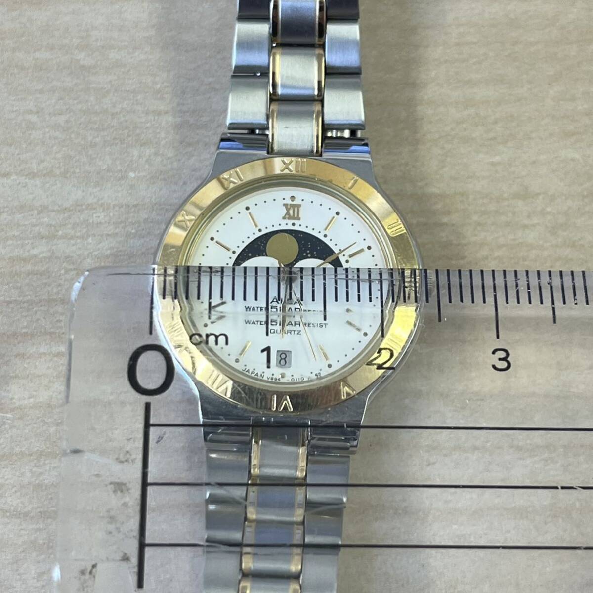【T0425】ALBA アルバ 腕時計 クォーツ V849-0060 白文字盤 不動品 動作未確認 ケース付きの画像6