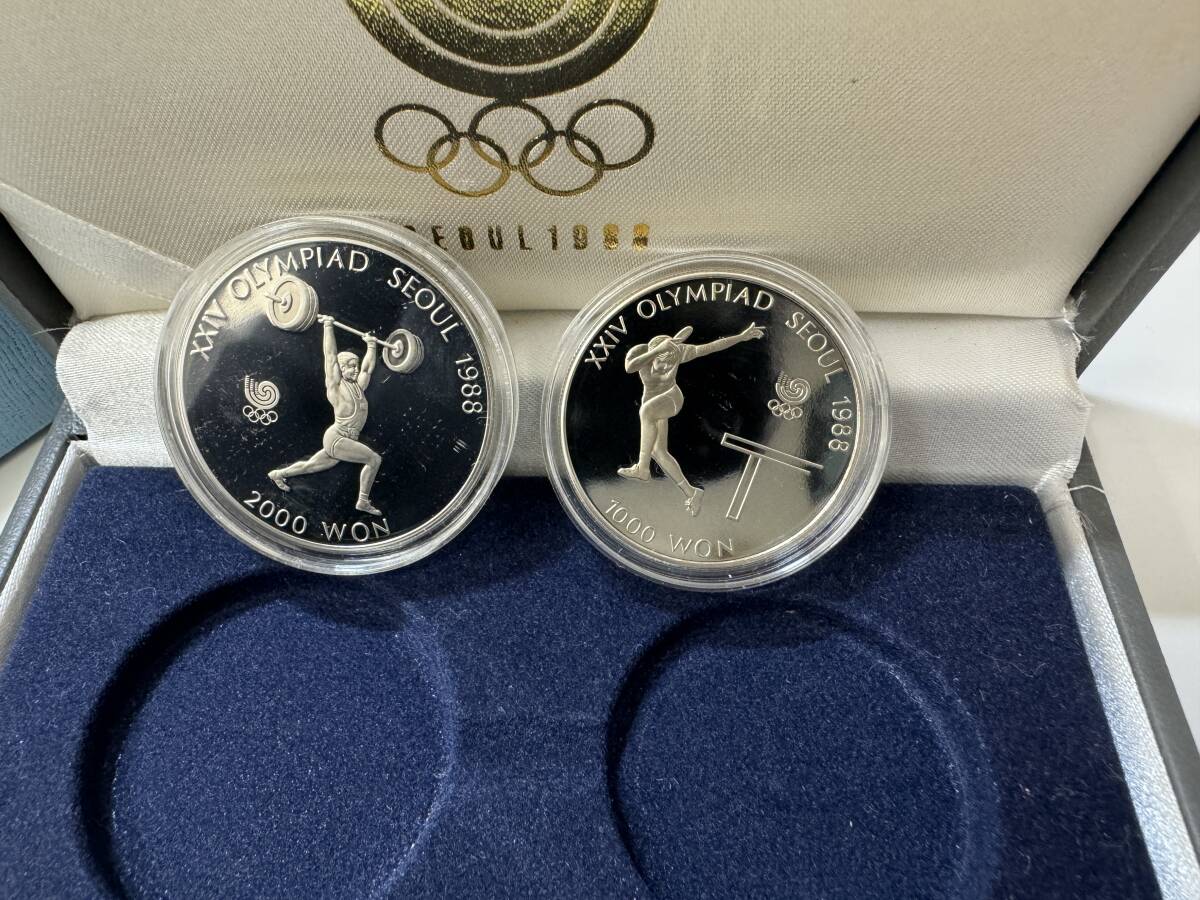25177■1988 ソウルオリンピック 2000/1000ウォン 記念硬貨（コイン）2枚 ケース付き/卓球 ウェイトリフティングの画像2