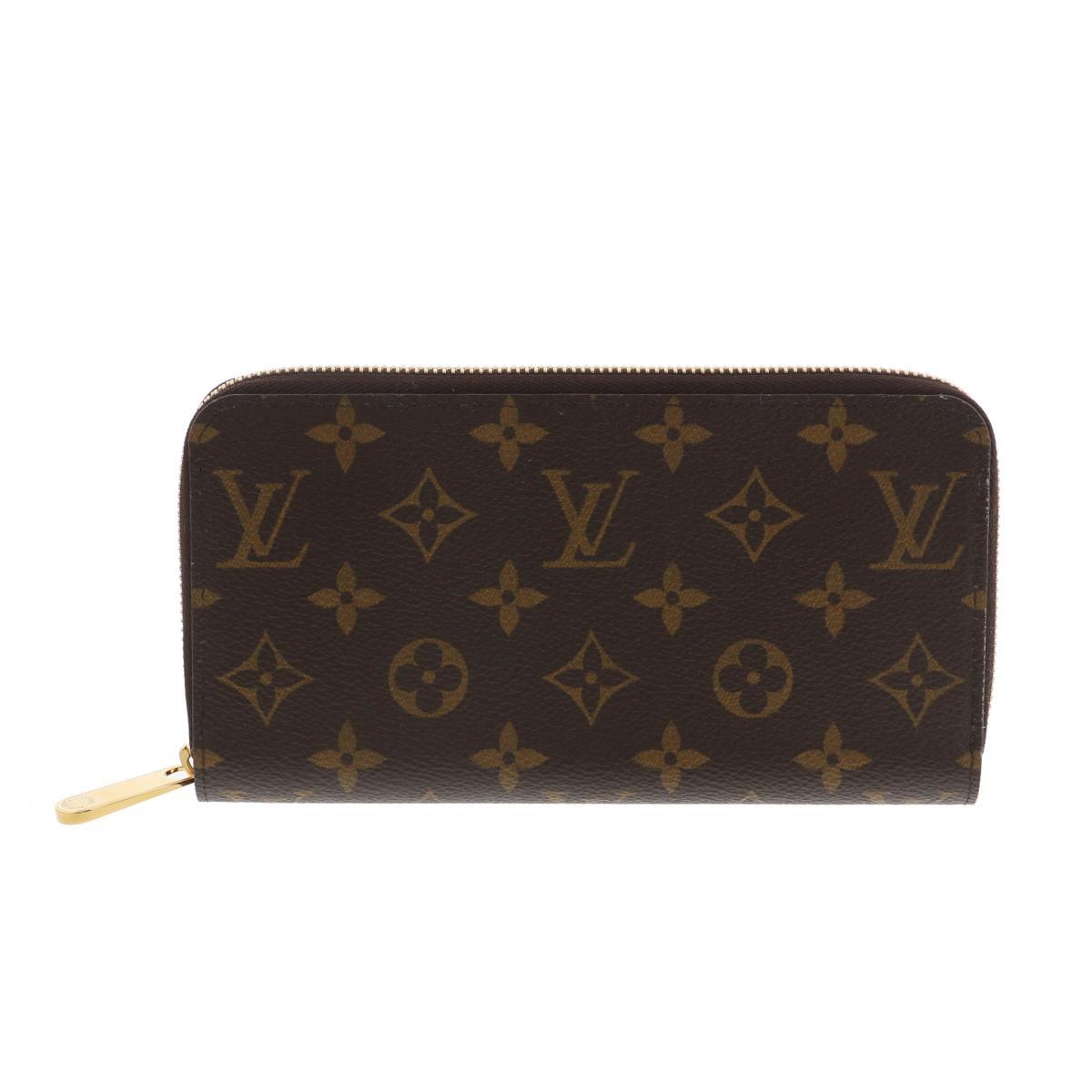 LOUIS VUITTON ルイヴィトン 財布 長財布(小銭入有) モノグラム ブラウン 未使用品 M42616 Brown PVC ジッピー・ウォレット_画像1