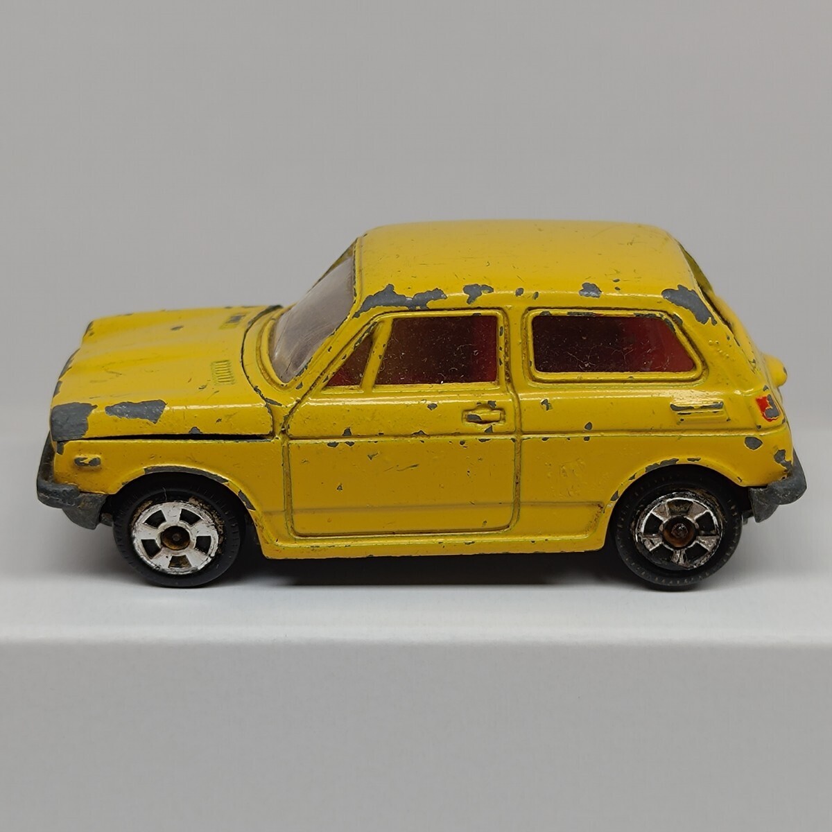 No.10-1-4 Tomica Honda NIII 360 1/54 Hong Kong производства разрозненный подлинная вещь переднее стекло трещина есть желтый 